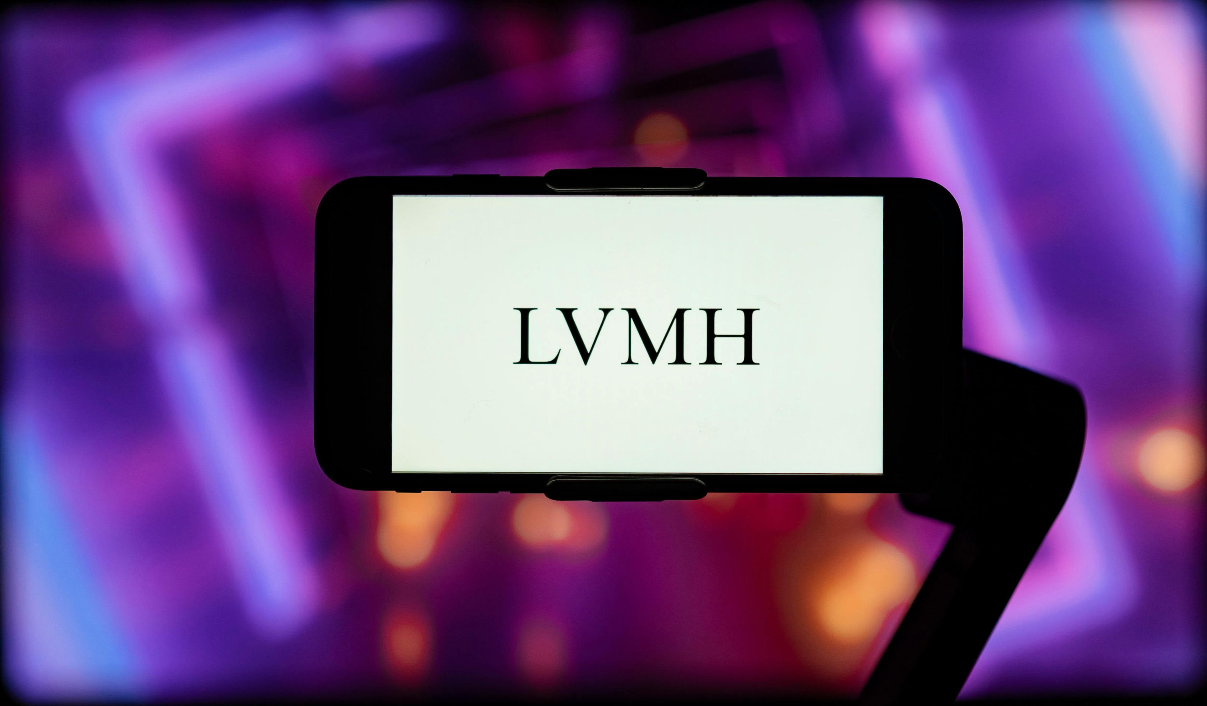 The logo of LVMH on a smartphone.