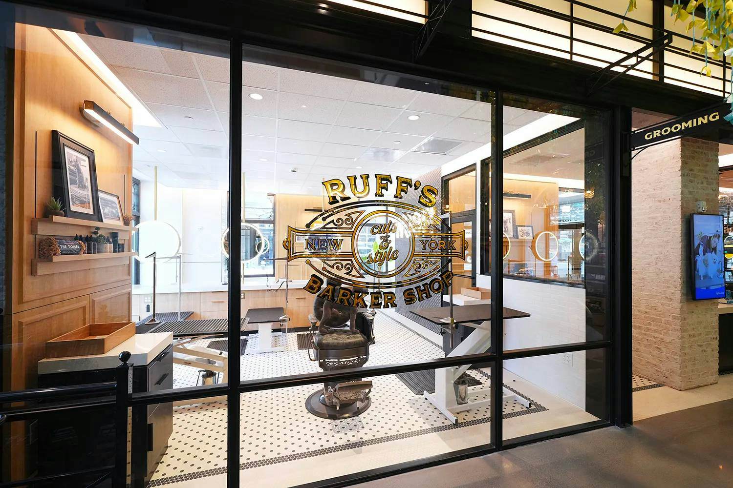 The dog grooming area inside Petco’s NYC flagship is called Riuff’s Barker Shop.