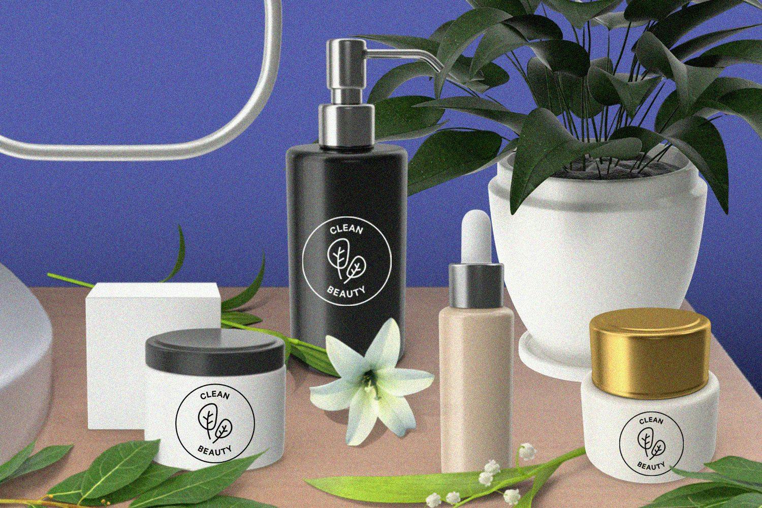 Clean beauty products on a table with plants, leaves, and flowers