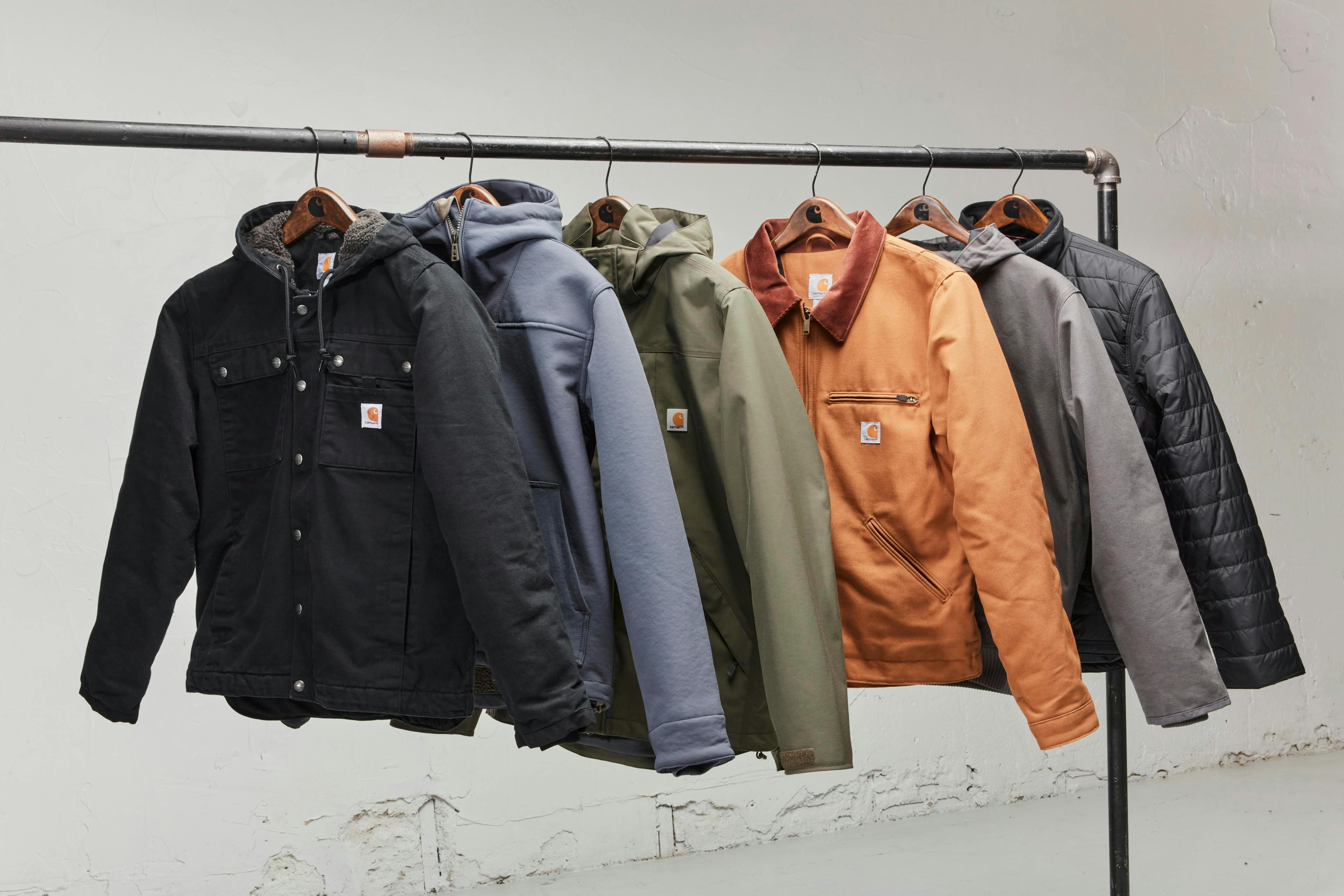 Carhartt jacket sitting on a rack for display